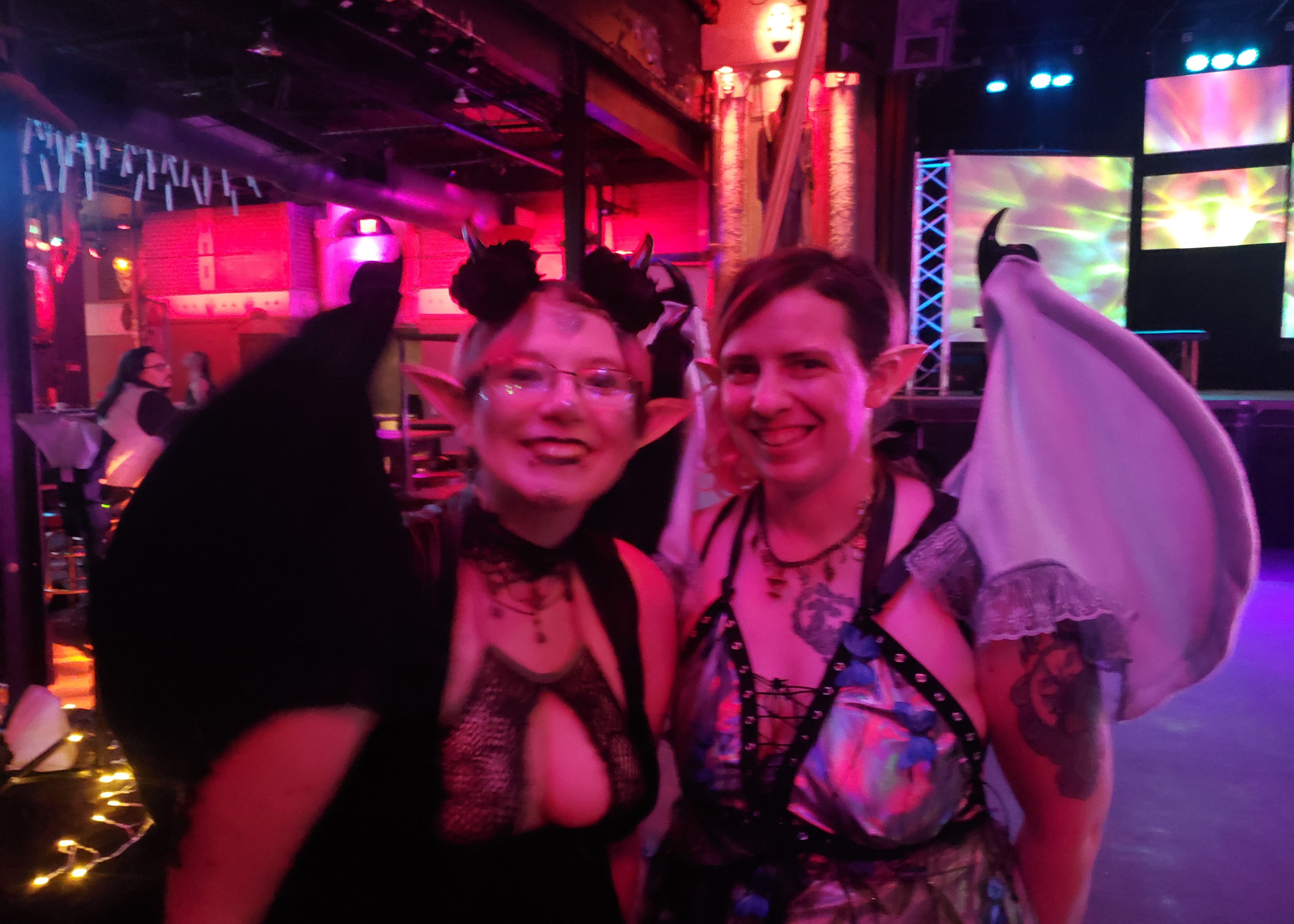 Photo of a demon and a fairy at a Night Club.